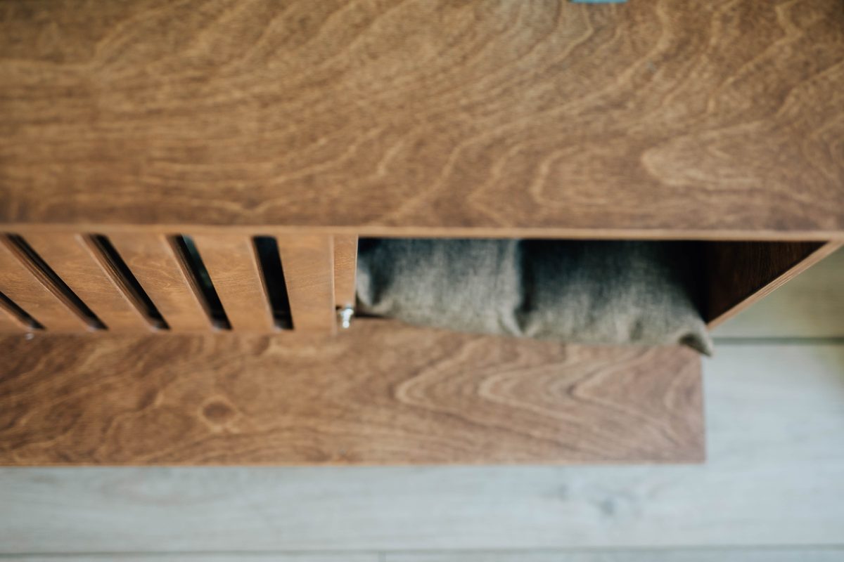 Close-up of the handcrafted plywood detailing on a Kokaa pet house